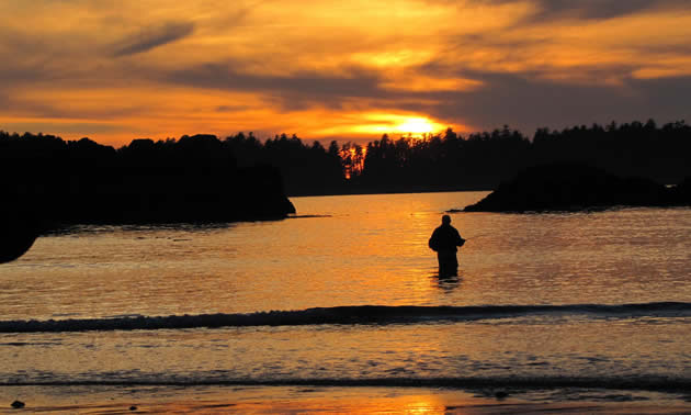 Sunset at Crystal Cove. Fisherman unknown.