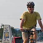 people riding their bikes on the coast of BC