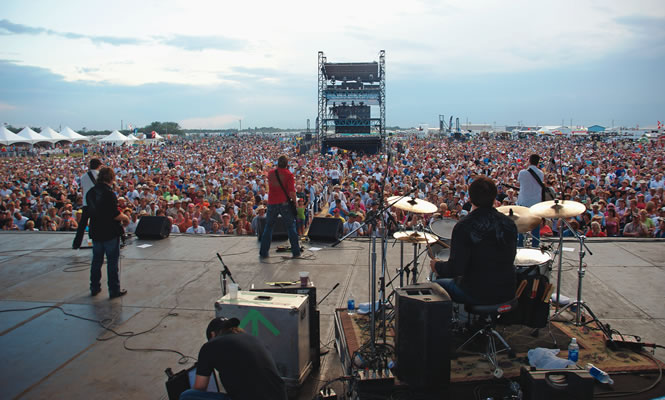 people playing music on stage