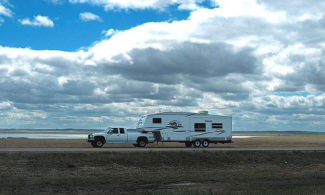 RV driving through the prairie