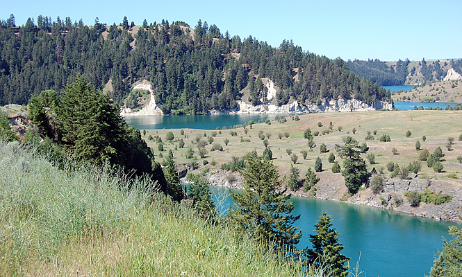 river flowing through hills