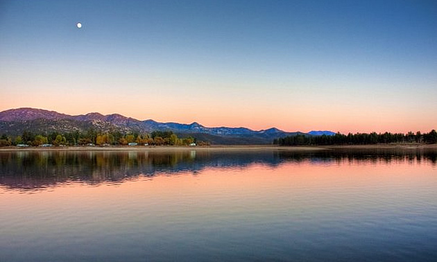 lake with trees in the distance