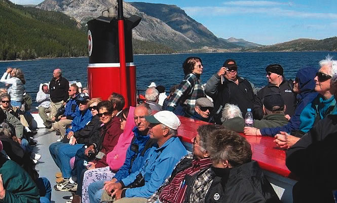 people on a boat touring Lethbridge