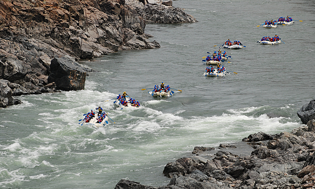 people rafting down a river