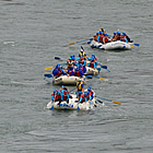 people rafting down a river