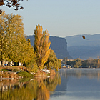 Lake with fall trees around it