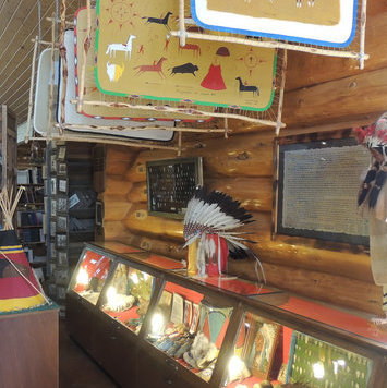 A display of Native American artifacts. Photo courtesy Kootenai Brown Pioneer Village.