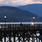 wharf with people walking along it, in Salmon Arm, BC