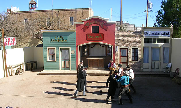 people staging a gun fight