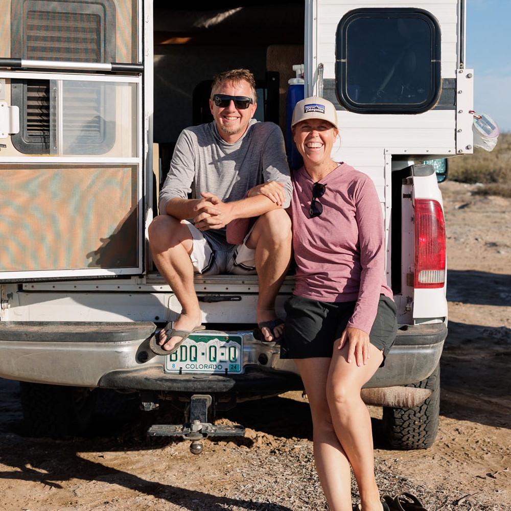 Michele and Mark beside one of their RV units