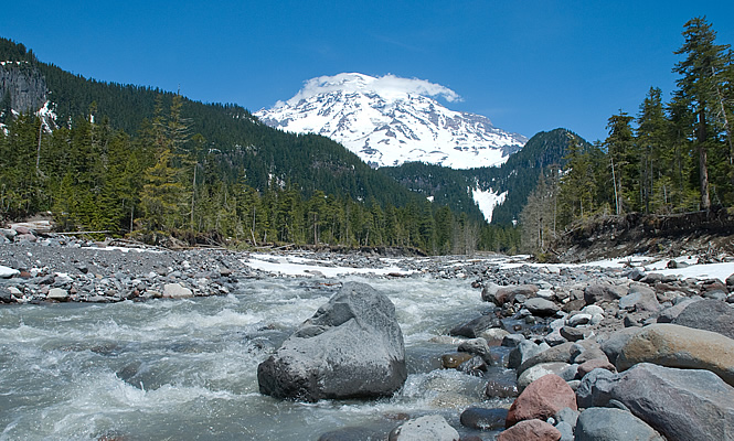 mountain with a river below